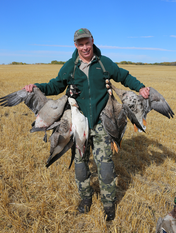 Hunter with geese
