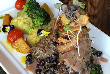 Elk Roast with Bourbon Saskatoon Cream
